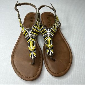 Report Sandals with tribal beaded pattern
